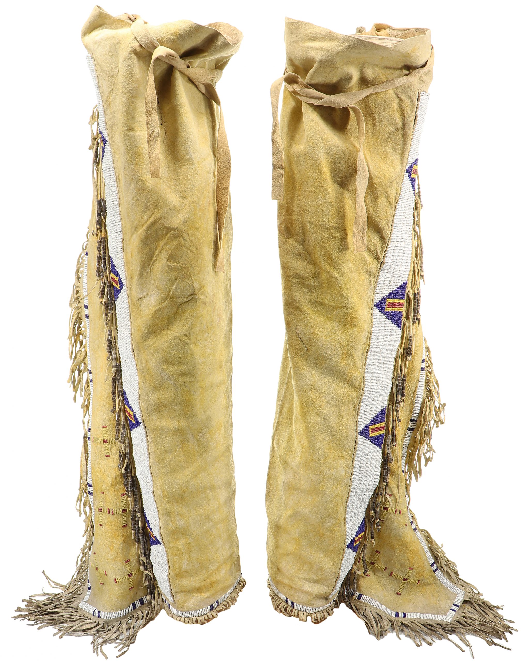 Lot - Sioux Native American Indian beaded leather leggings with diamond  design, c. 1880-1890.